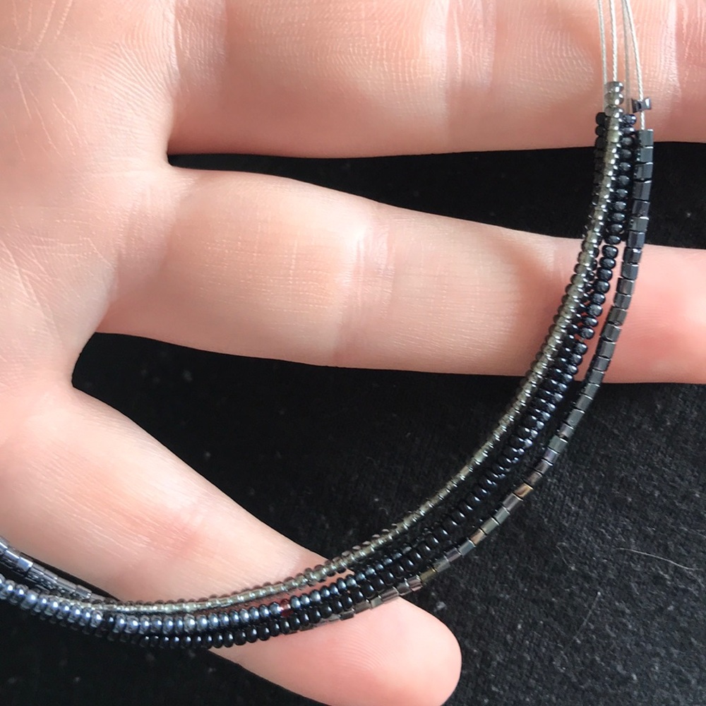 FOUR STRAND STATEMENT NECKLACE